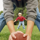 Illustration for article titled Long-Snapper And Son Long-Snap A Few Balls Around Backyard